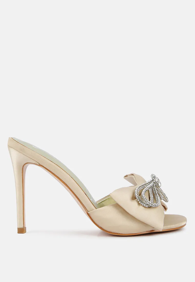 Brag in rhinestone embellished bow satin heels