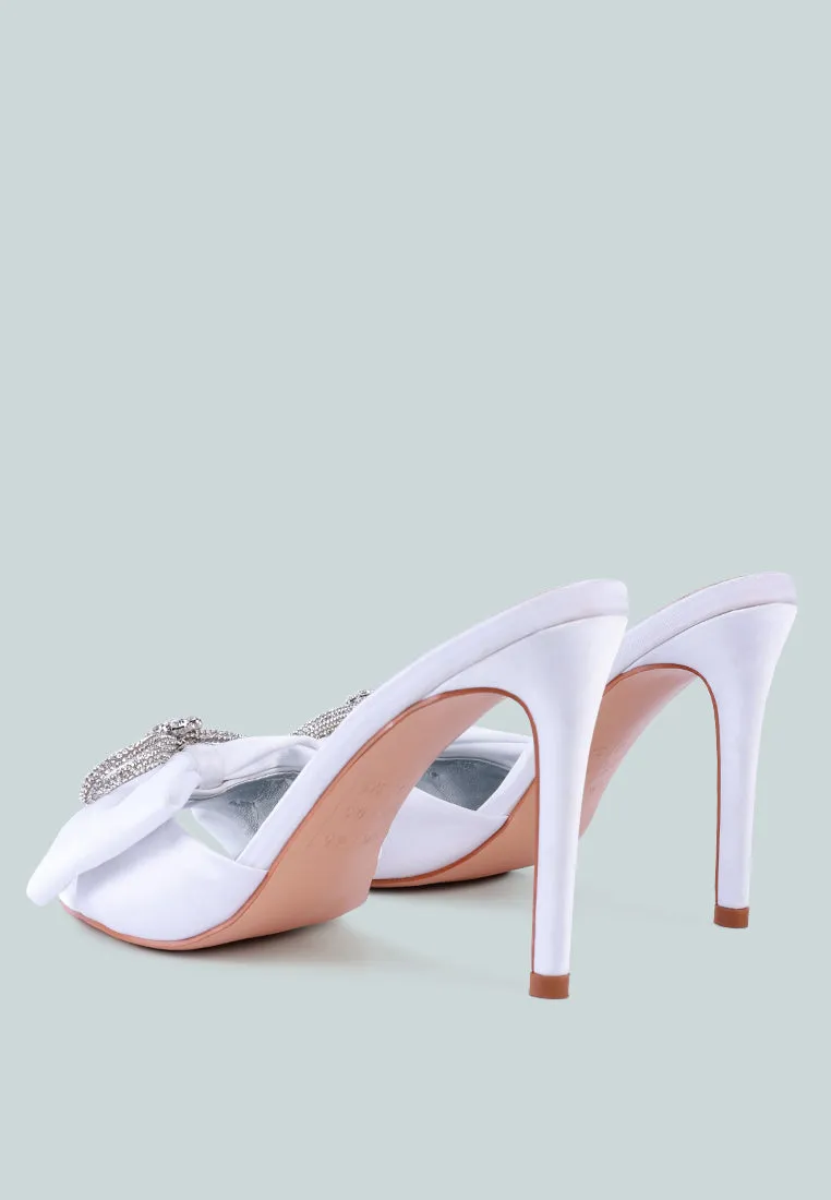 Brag in rhinestone embellished bow satin heels