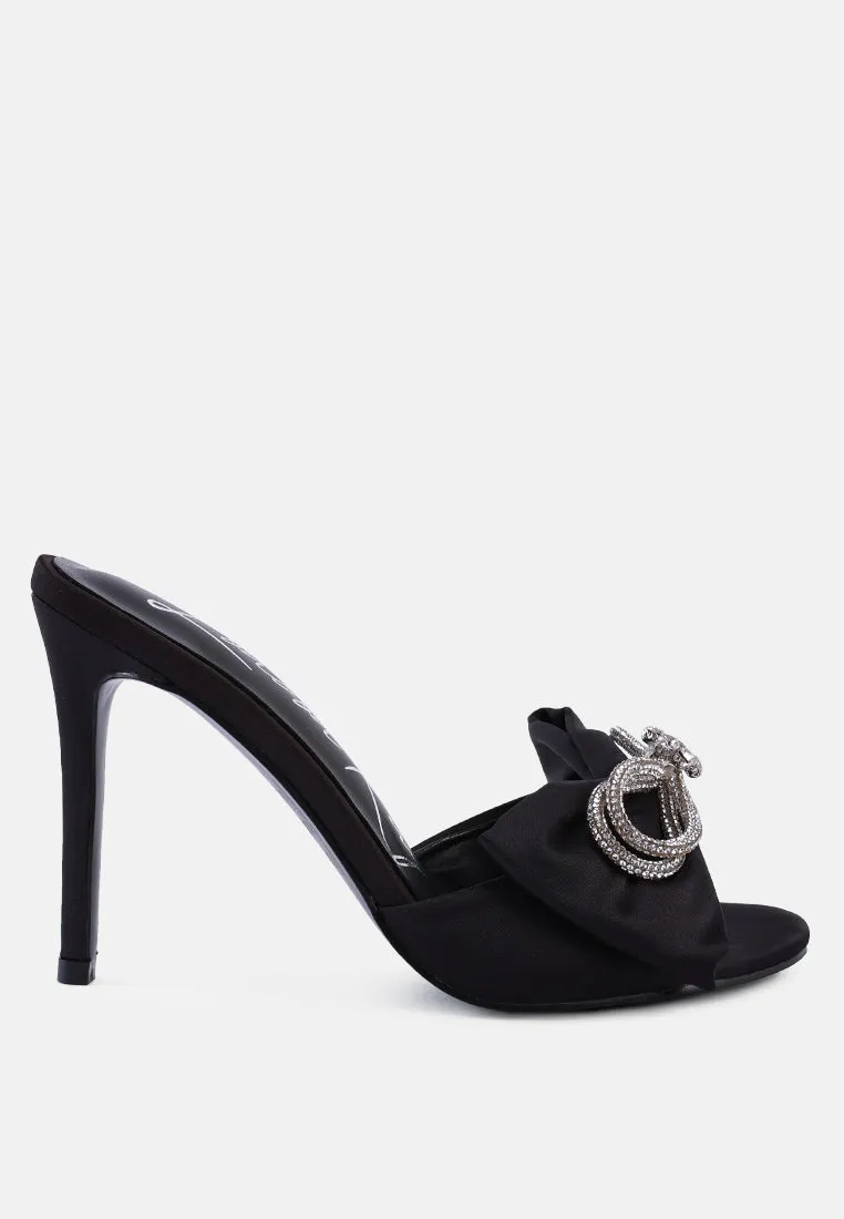 Brag in rhinestone embellished bow satin heels