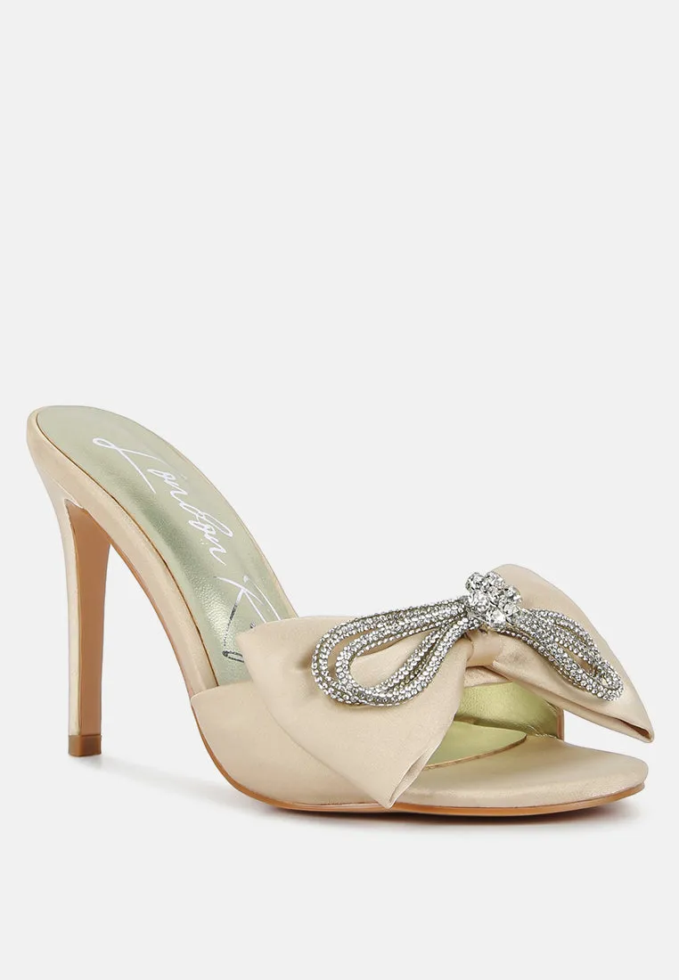 Brag in rhinestone embellished bow satin heels