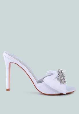 Brag in rhinestone embellished bow satin heels