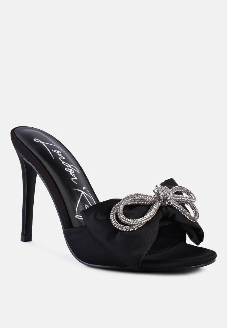 Brag in rhinestone embellished bow satin heels