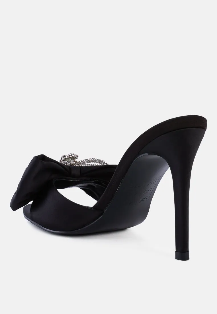 Brag in rhinestone embellished bow satin heels